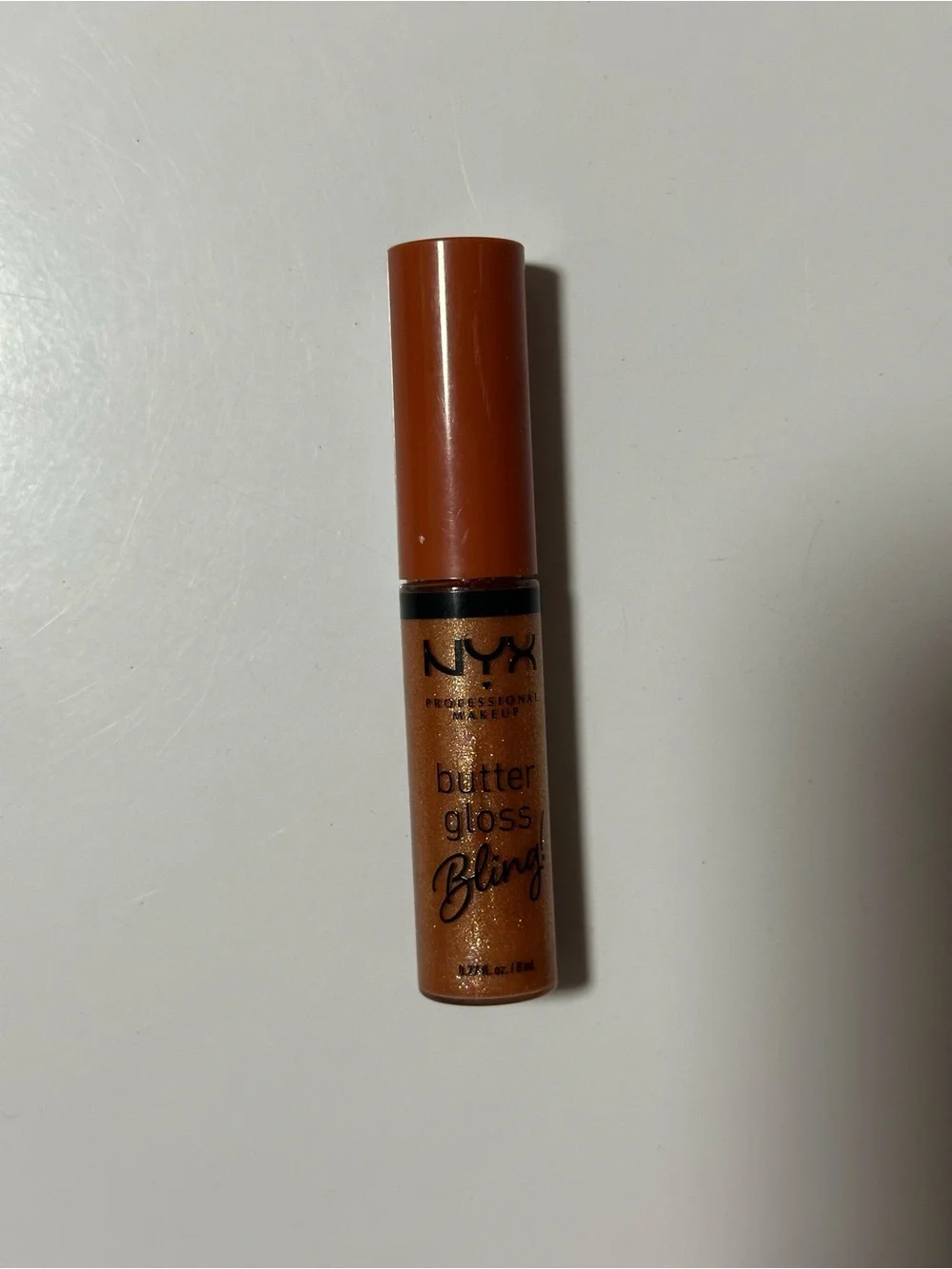 NYX Butter Gloss Bling Lip Gloss — Sparkling Copper Shimmer